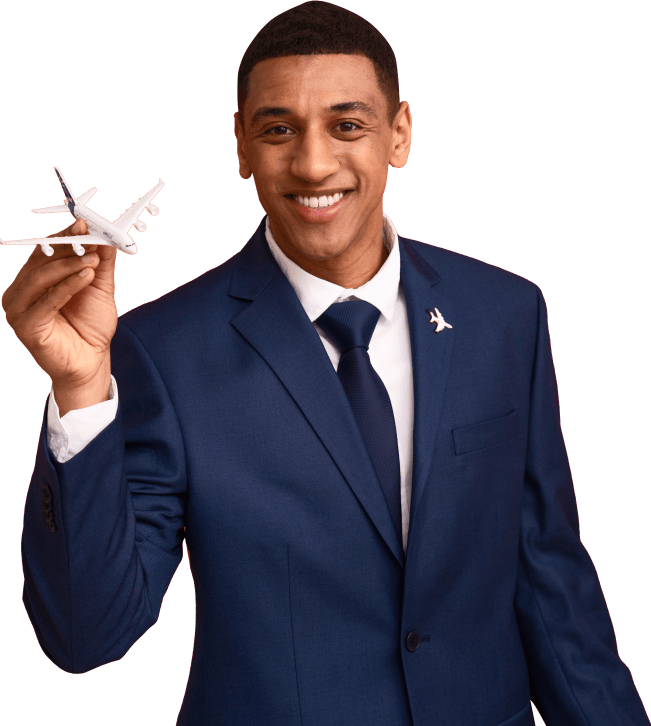 JIC immigration consultant holding a model aircraft